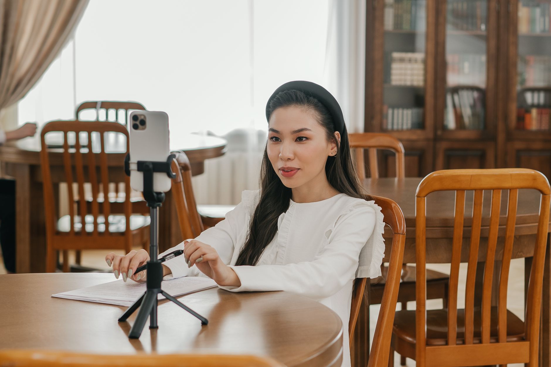 Open notebook beside a reading lamp
